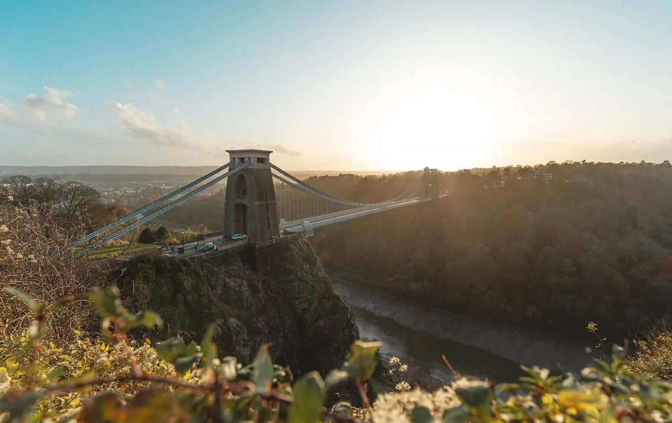 View of Bristol's skyline with historic buildings and vibrant street life.