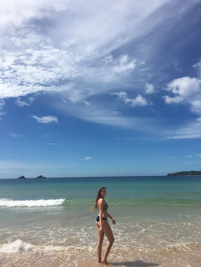 Serene Napcan Beach in El Nido, one of the top 10 places to see for tranquility and stunning views.