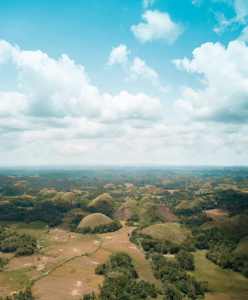 Breathtaking Chocolate Hills in Bohol, an iconic landmark in the top 10 places to see in the Philippines.