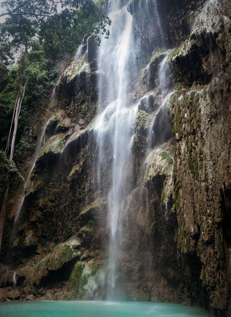 Crystal-clear waters of Tumalog Falls, a top destination in the Philippines.