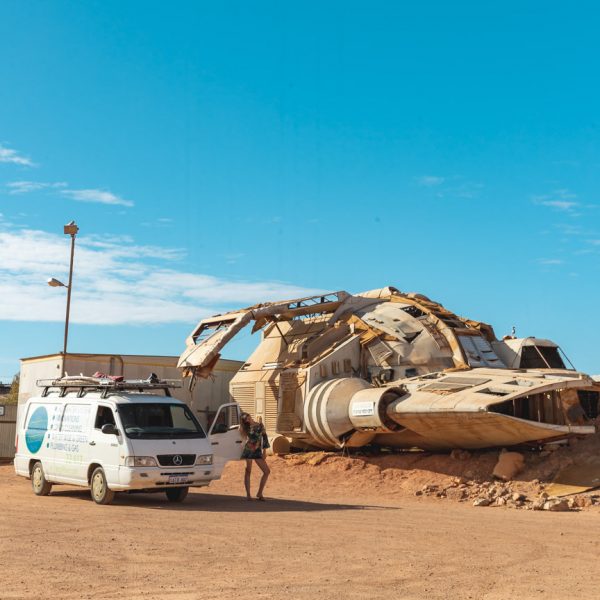 Van parked in the Australian outback, surrounded by stunning landscapes