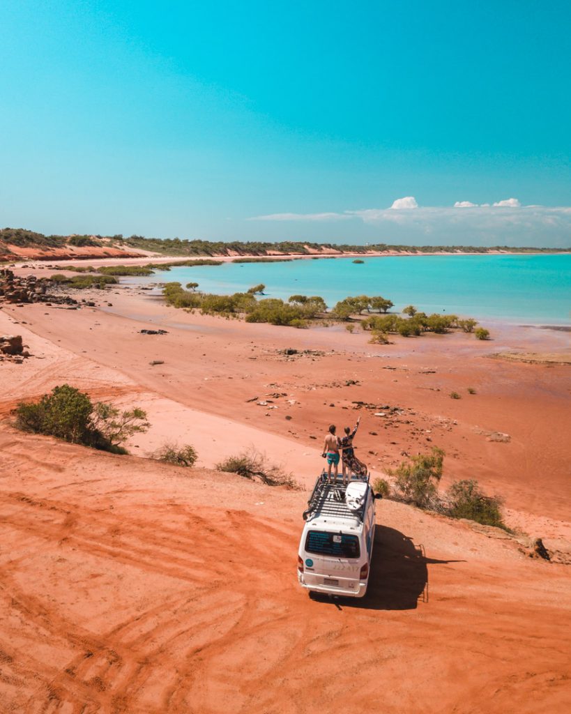 Van parked in the Australian outback, surrounded by stunning landscapes.
