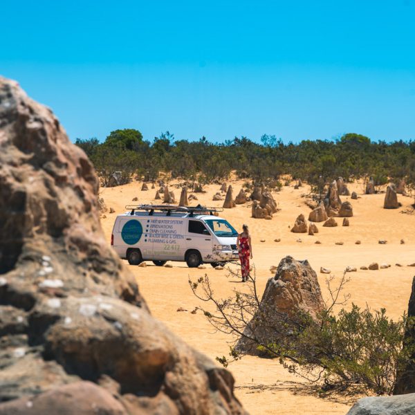 Van parked in the Australian outback, surrounded by stunning landscapes