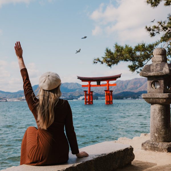 The iconic floating Torii gate of Itsukushima Shrine, perfect for day trips from Osaka. how to prepare for your Japan trip essentials