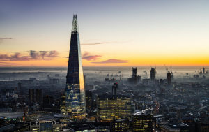 Stunning nighttime view of London from The Shard, with city lights illuminating the skyline.