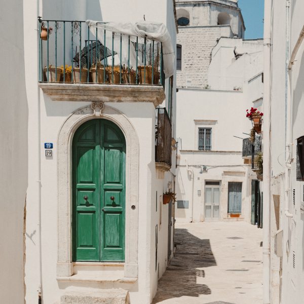 Old town alleyway with stone buildings in Italy