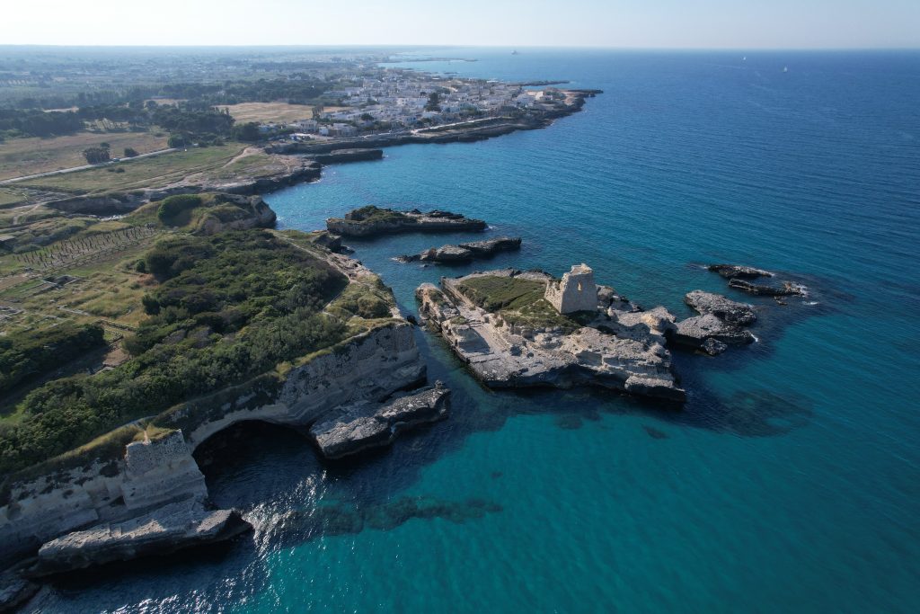 Southern Puglia coastline with white-washed buildings and turquoise sea