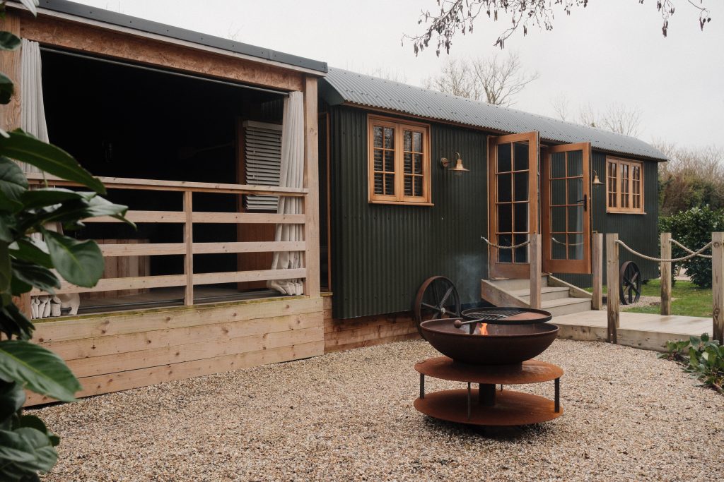 Hot tub at the Tewinbury Lake Huts with peaceful river views