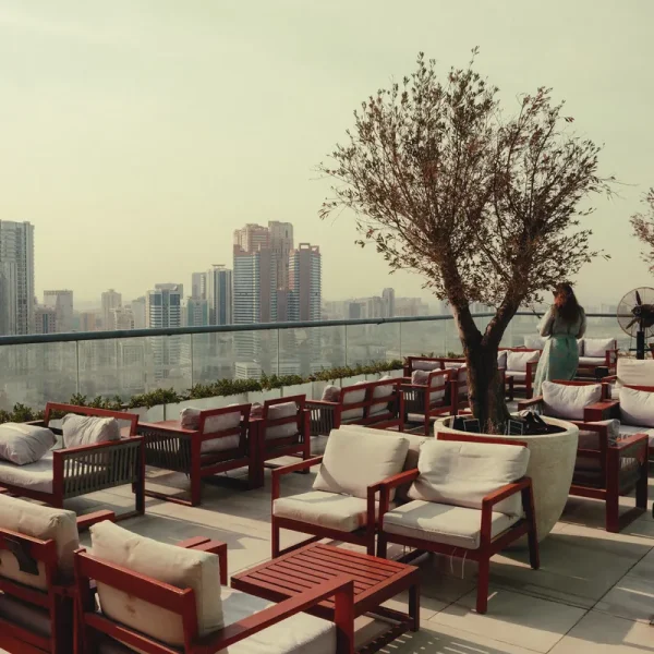 Outdoor terrace of Baitna Café on the 30th floor with views over Sharjah