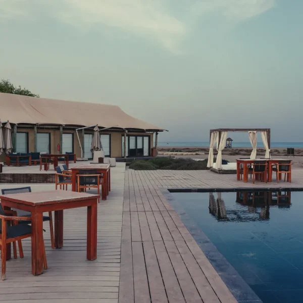 Main pool and restaurant deck at Kingfisher Retreat on the Gulf of Oman
