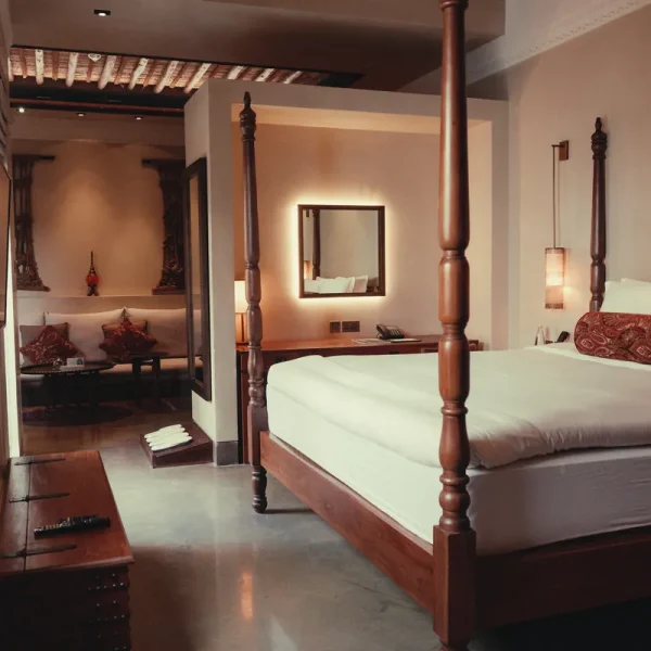 Four-poster bed in a heritage room at The Chedi Al Bait, Sharjah